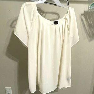 Dressy blouse. Great used condition. Cream color, size 1x.